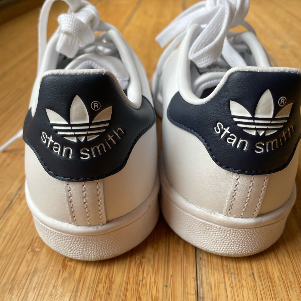 Adidas Stan Smiths. Worn one time.  Run large.